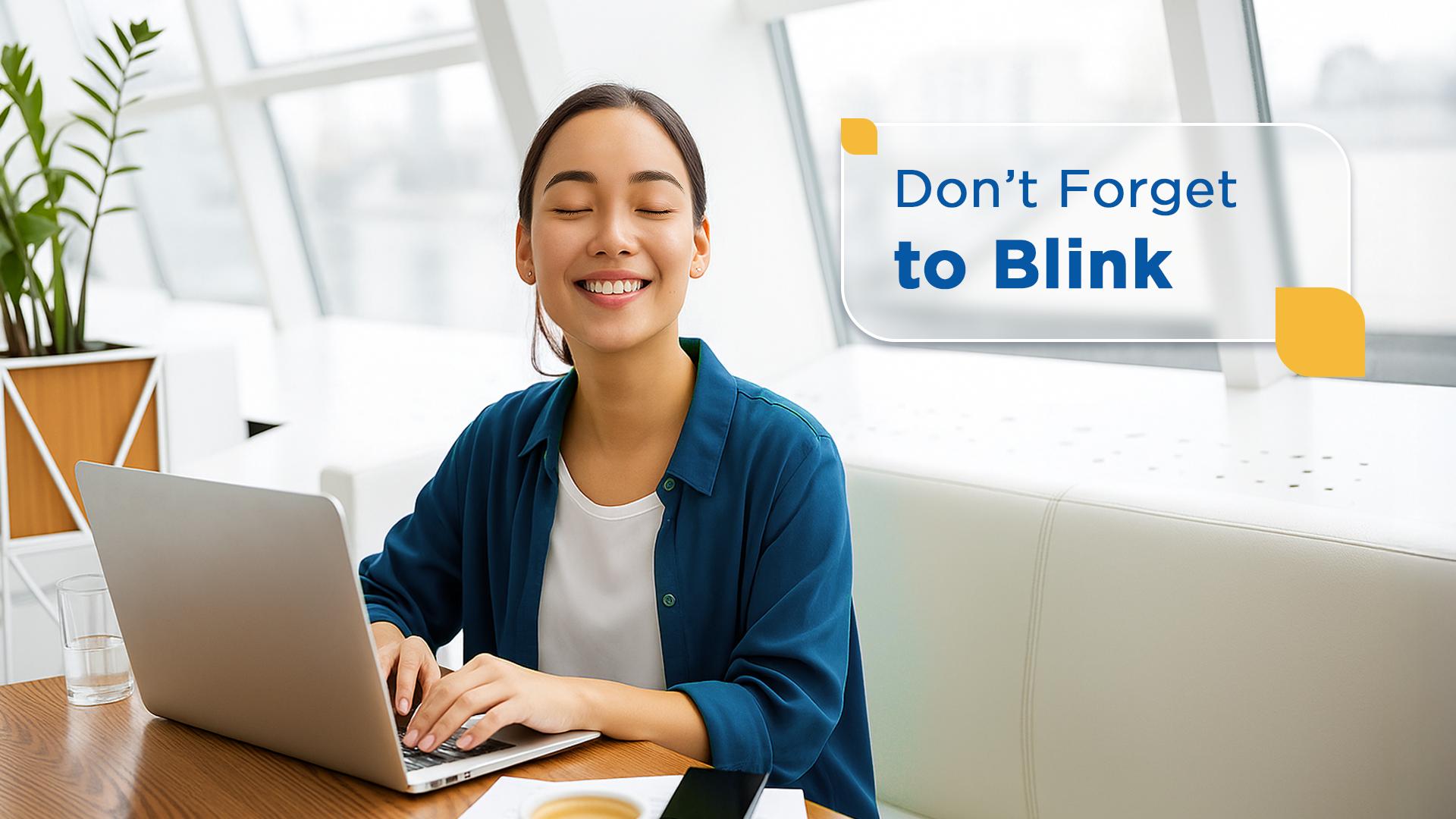 Woman at laptop — don't forget to blink