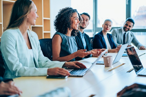 Group of business persons in business meeting. Group of entrepreneurs on meeting in board room. Corporate business team on meeting in the office.