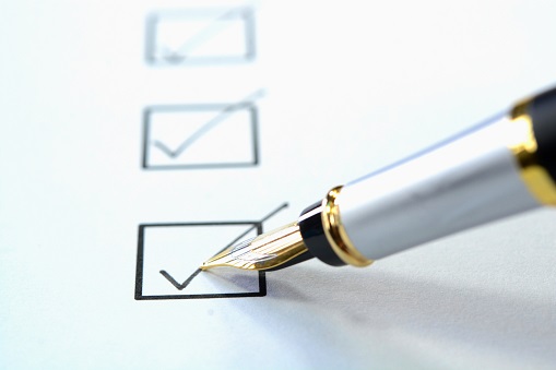 Tick mark on a check box using fountain pen.