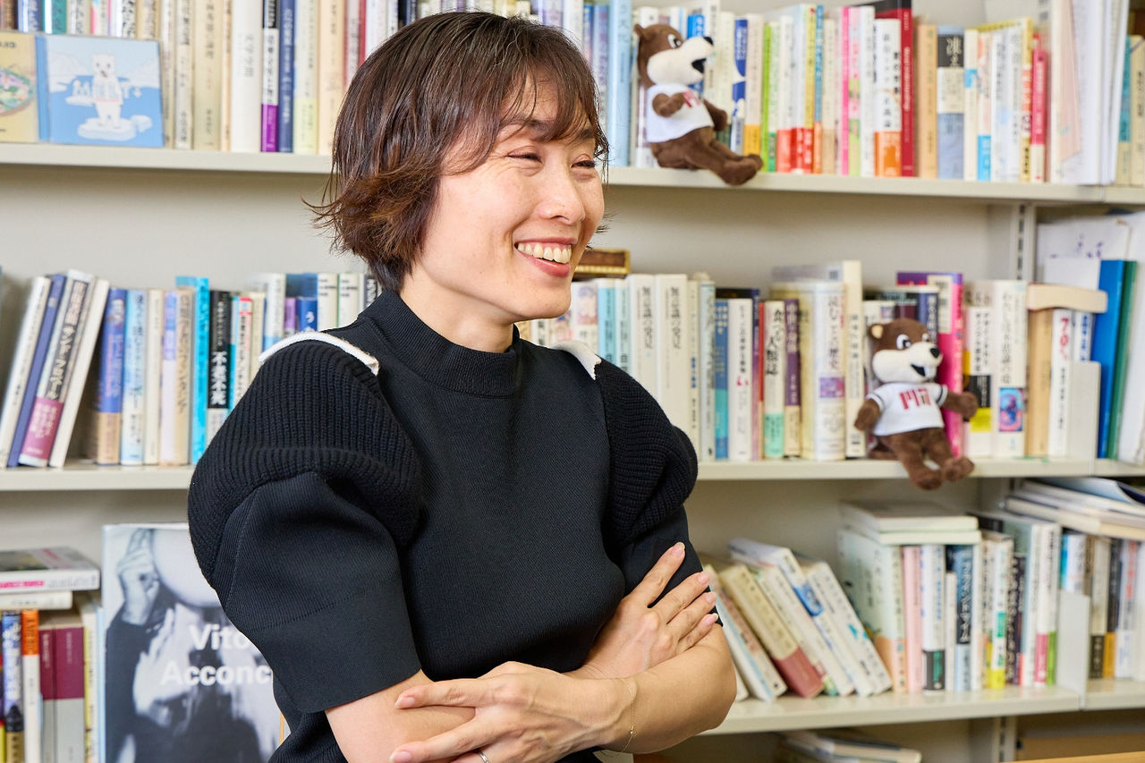 A photo of Professor Ito smiling as she answers questions during an interview