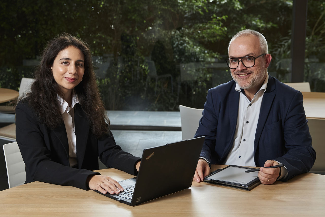 A photo of Nadiya and Etienne looking toward the camera